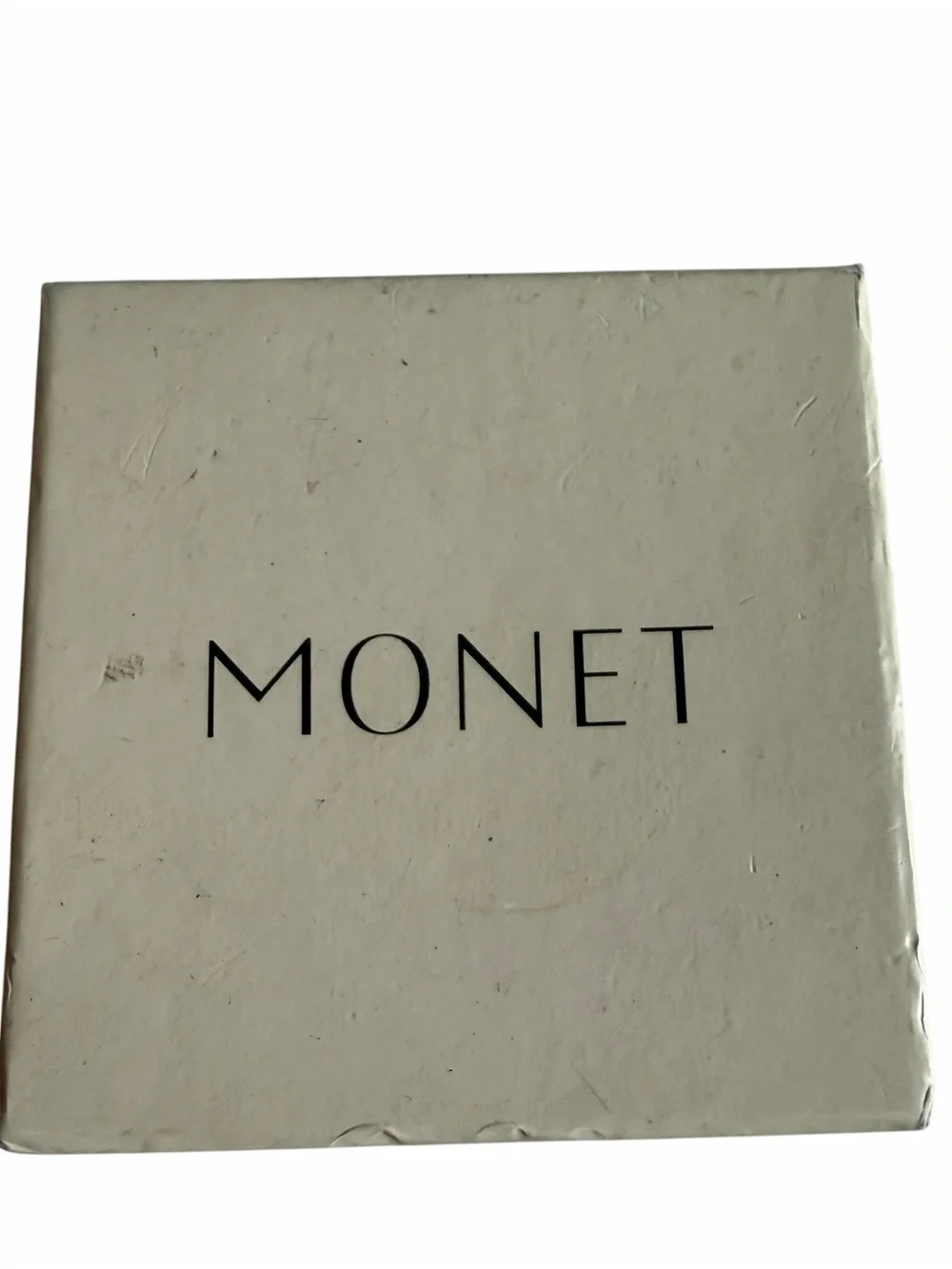 Beautiful signed Monet necklace and matching earrings set in the original Monet
